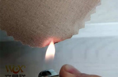What is the basic principle of flame retardant fabrics?