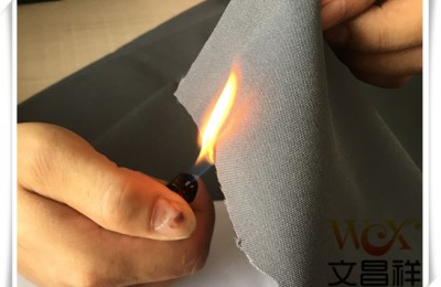 What is the principle of fire-retardant Oxford cloth?